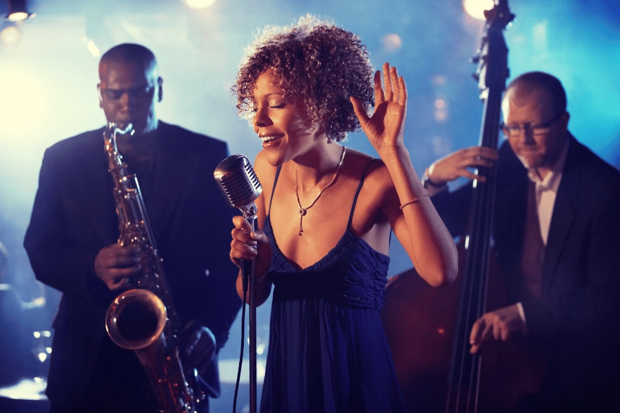 woman singing and jazz band playing live 